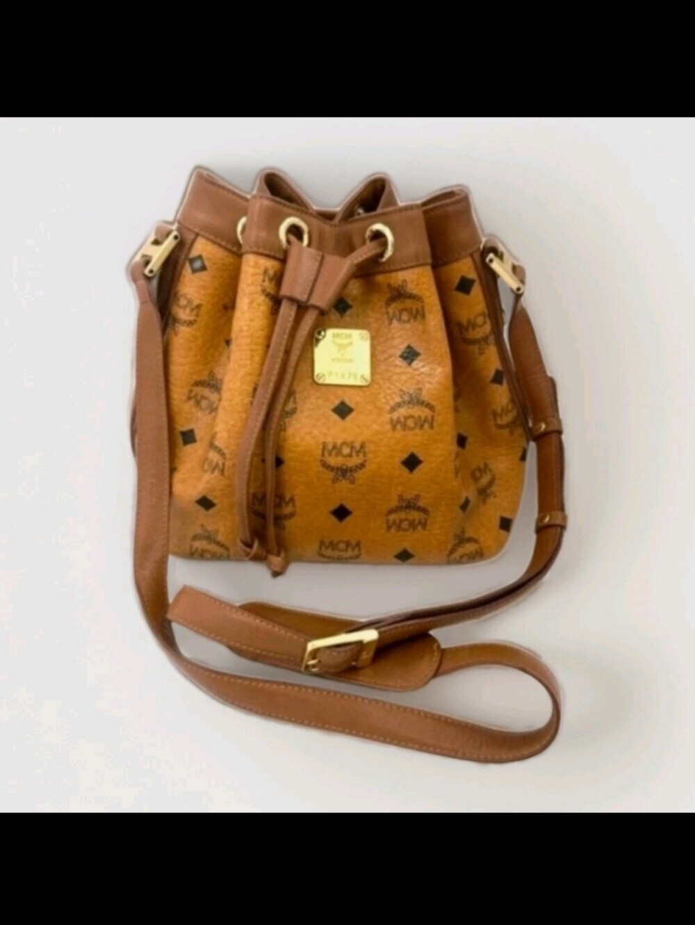 Authentic Large MCM Visetos Cognac Drawstring Bucket Sling Bag